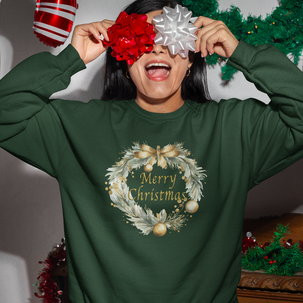 Person wearing a green Christmas-themed sweatshirt with wreath and 'Merry Christmas' text, surrounded by festive decorations.