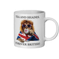Mug with a lion wearing sunglasses and a Union Jack flag, text 'Tea and Shades. Forever British!' on a white background.