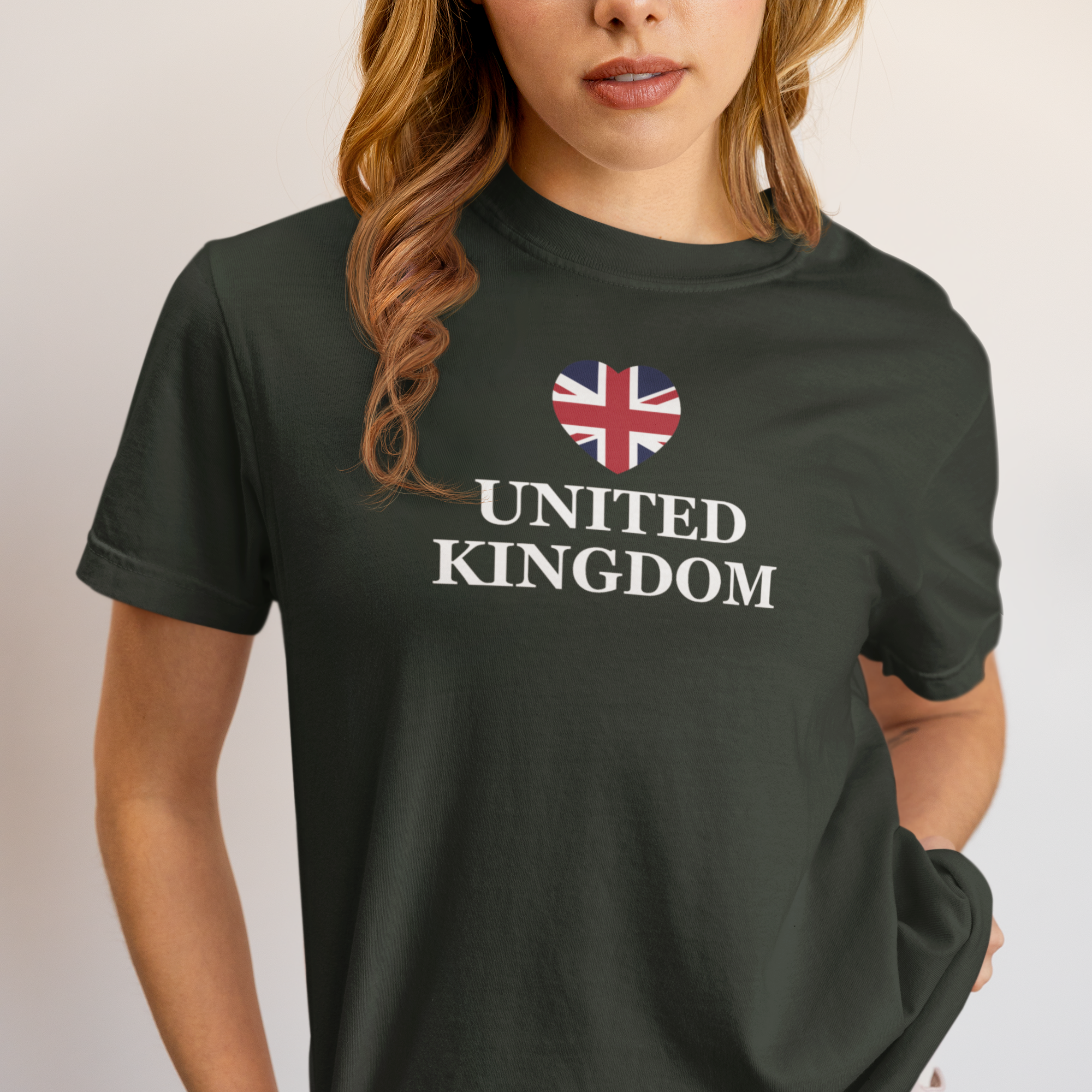 Person wearing a black t-shirt with 'United Kingdom' and a Union Jack design.