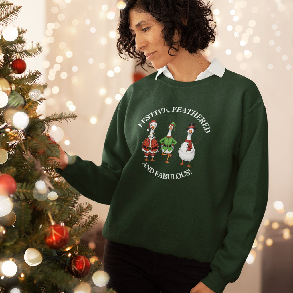 Female wearing a green sweater with festive design in front of a decorated Christmas tree.