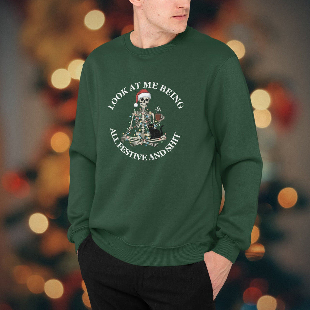 Person wearing a green sweatshirt with a graphic design in front of a blurred festive background