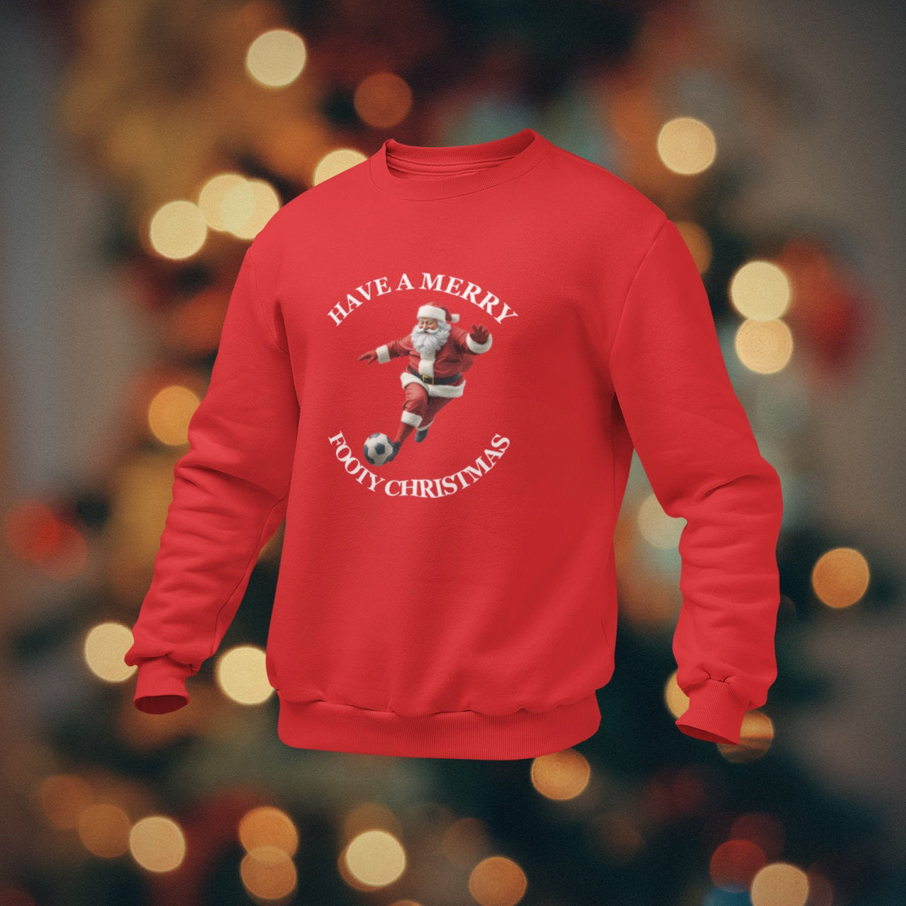 Red sweatshirt with Christmas design on a blurred festive background