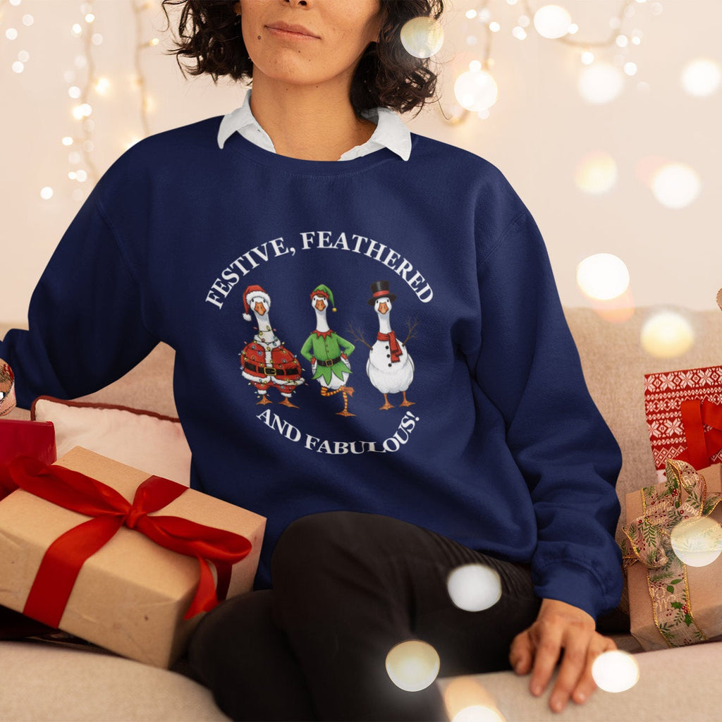 Female wearing a navy blue sweater with a festive design in a decorated room with lights and presents.