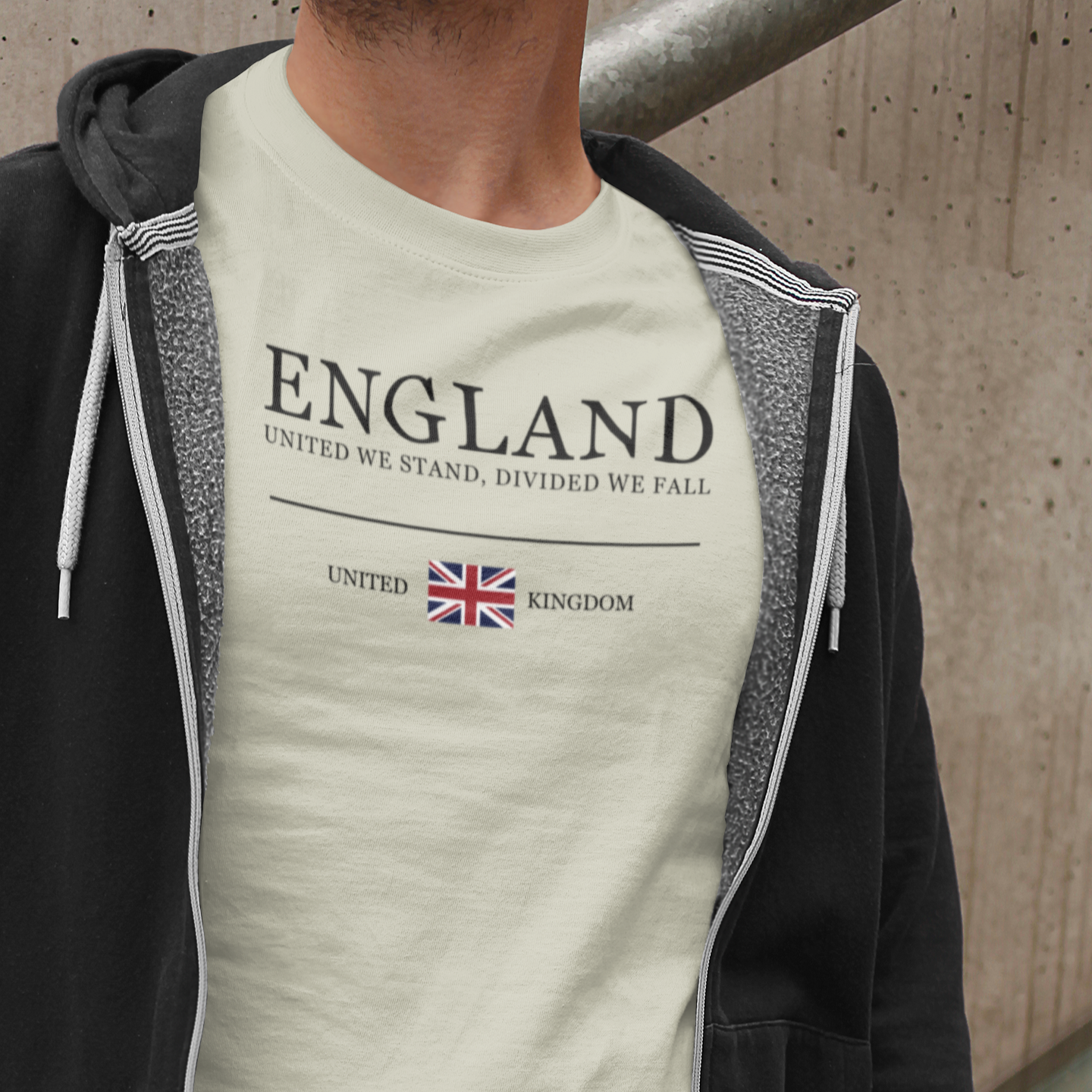 Person wearing a t-shirt with 'England' text and British flag design.