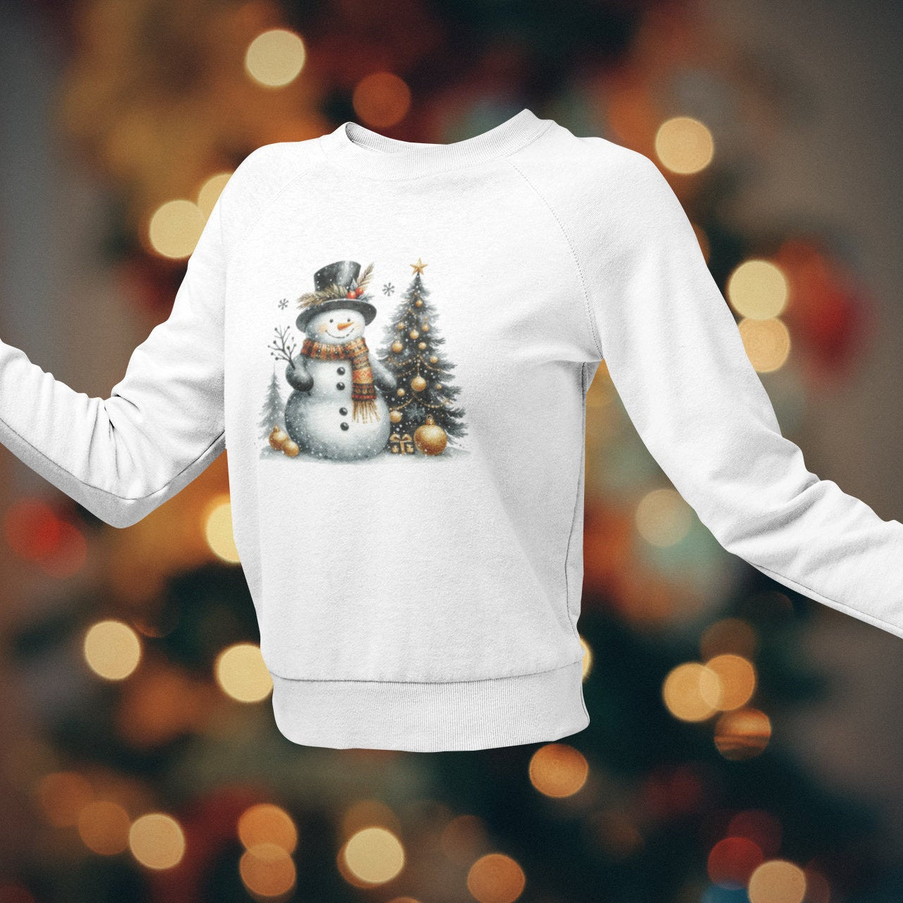 White sweatshirt with a snowman design on a blurred Christmas tree background