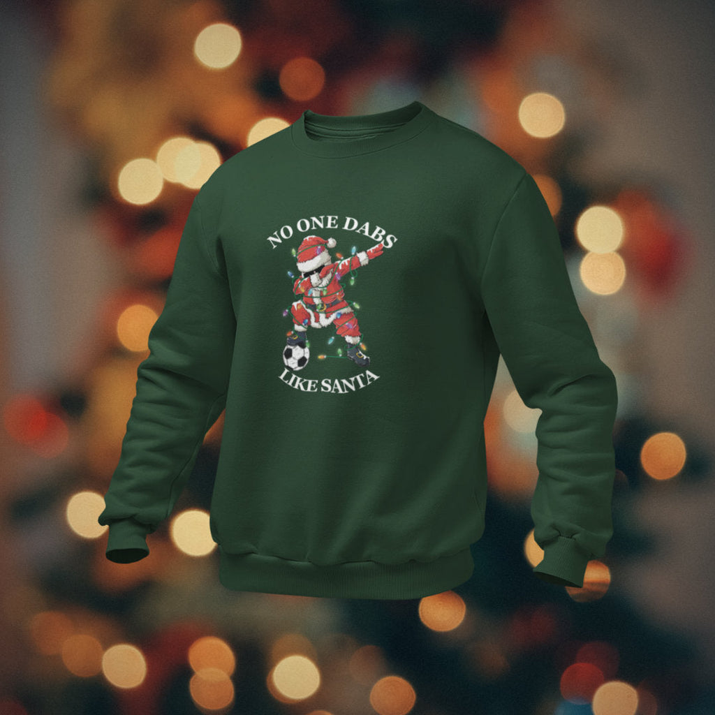 Green sweatshirt with a Christmas-themed graphic on a blurred lights background